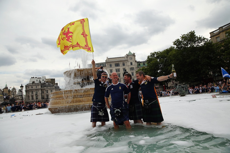 Illustration for article titled A Photo Tribute To Drunk Scottish Fans